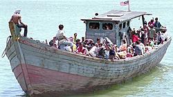 Click image for larger version. 

Name:	823188-refugee-boat.jpg 
Views:	8 
Size:	65.8 KB 
ID:	75646